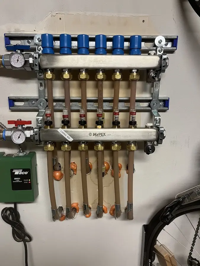 Plumber performing Water Heater Repair at a residential property in Hobart